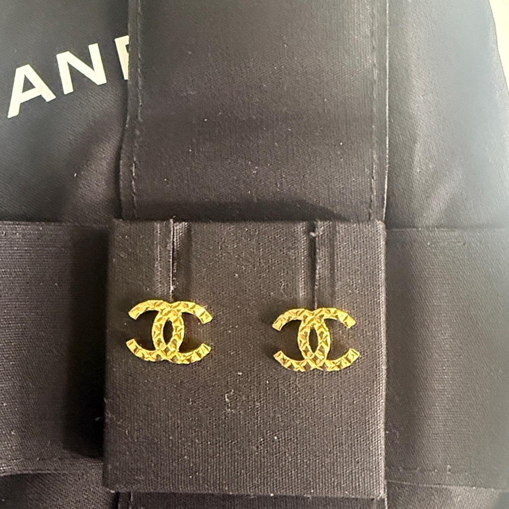 CHANEL Gold Logo Stud Earrings